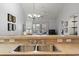 Kitchen sink featuring updated fixtures and view into the living space at 4420 Eastport Blvd. # M12, Little River, SC 29566