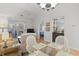 Open living space features a bar area, slider to porch, and view into the bedroom at 4420 Eastport Blvd. # M12, Little River, SC 29566