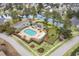 An aerial view of neighborhood pool, playground, parking and green space at 481 Morning Glory Ct., Myrtle Beach, SC 29579