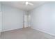 Neutral bedroom with a ceiling fan and an open door to a closet at 481 Morning Glory Ct., Myrtle Beach, SC 29579
