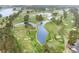 Aerial view of a pristine golf course featuring lush fairways and scenic water features at 481 Morning Glory Ct., Myrtle Beach, SC 29579