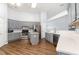 Modern kitchen with stainless steel appliances, gray cabinets, an island, and white countertops at 481 Morning Glory Ct., Myrtle Beach, SC 29579