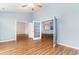Bright living room with hardwood floors and french doors leading to other rooms at 481 Morning Glory Ct., Myrtle Beach, SC 29579