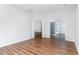 Open living room with hardwood floors provides access to multiple rooms at 481 Morning Glory Ct., Myrtle Beach, SC 29579