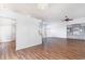 Open-concept living room boasts hardwood floors, crown molding, and great natural light at 481 Morning Glory Ct., Myrtle Beach, SC 29579