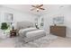 Serene bedroom with neutral tones, plush carpeting, and large windows offering ample natural light at 481 Morning Glory Ct., Myrtle Beach, SC 29579