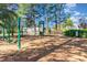 Community playground area with swings, slide, and climbing equipment at 481 Morning Glory Ct., Myrtle Beach, SC 29579