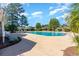 Relaxing community pool area with ample seating and lush landscaping at 481 Morning Glory Ct., Myrtle Beach, SC 29579