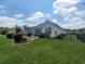 Spacious backyard with lush lawn, patio area, and mature landscaping for outdoor living and entertaining at 5318 Tremiti Ln., Myrtle Beach, SC 29579