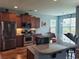 Kitchen showcasing stainless steel appliances, granite countertops, and a center island with bar seating at 5318 Tremiti Ln., Myrtle Beach, SC 29579