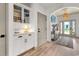 Hallway with a built-in bar and cabinet at 533 Canborough Lane, Murrells Inlet, SC 29576