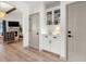 Bright hallway with a built-in bar and entry into the living room at 533 Canborough Lane, Murrells Inlet, SC 29576