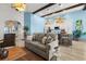 Open-concept living area with a seamless transition to the kitchen, designed for modern living and entertaining at 533 Canborough Lane, Murrells Inlet, SC 29576