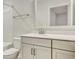 Bright bathroom featuring a sink with white vanity and framed mirror at 568 Canborough Lane, Murrells Inlet, SC 29576