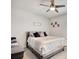 Cozy bedroom features a comfortable bed with ceiling fan and carpet at 568 Canborough Lane, Murrells Inlet, SC 29576