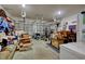 Spacious garage with multiple doors, with ample storage space, and organization for various equipment at 568 Canborough Lane, Murrells Inlet, SC 29576