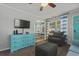 Cozy living room with a turquoise dresser, a ceiling fan, and a seating area at 6001 - 1308 S Kings Hwy., Myrtle Beach, SC 29575