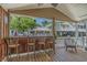 Spacious outdoor porch with a built-in bar, comfortable seating, and a relaxed atmosphere for entertaining guests at 6001 - 1308 S Kings Hwy., Myrtle Beach, SC 29575