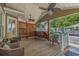 Inviting outdoor porch featuring ample seating, a bar area, and stylish decor perfect for relaxing and entertaining guests at 6001 - 1308 S Kings Hwy., Myrtle Beach, SC 29575