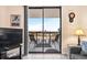 Balcony with seating overlooks the cityscape and ocean beyond at 601 Mitchell Dr. # 808, Myrtle Beach, SC 29577