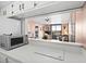 Kitchen area with white counters looks out over a pass through to living room and balcony at 601 Mitchell Dr. # 808, Myrtle Beach, SC 29577