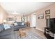 Bright living area with a view to the kitchen and other rooms, featuring comfortable seating and tile flooring at 601 Mitchell Dr. # 808, Myrtle Beach, SC 29577