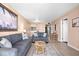 Bright living area with cozy sofas and a view to kitchen, featuring comfortable seating and tile flooring at 601 Mitchell Dr. # 808, Myrtle Beach, SC 29577