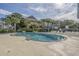 Inviting community pool surrounded by lush palm trees, offering a serene and relaxing atmosphere at 601 Mitchell Dr. # 808, Myrtle Beach, SC 29577