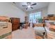 Storage room filled with boxes and furniture, potentially usable as a bedroom at 676 Lafayette Park Dr., Little River, SC 29566