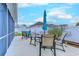 Outdoor patio features a dining table, umbrella, and comfortable seating; perfect for entertaining or relaxing at 676 Lafayette Park Dr., Little River, SC 29566