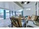 Cozy sun room featuring comfortable seating and views of the backyard and the house at 676 Lafayette Park Dr., Little River, SC 29566