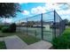 Tennis and pickleball courts featuring a fenced perimeter and well-maintained landscaping at 676 Lafayette Park Dr., Little River, SC 29566