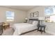 Bedroom with neutral carpet, large window and queen-size bed at 750 Plumage Ct., Myrtle Beach, SC 29588