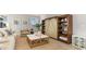 Cozy living room area with stylish furniture, decor, and a built-in bookcase with barn door at 750 Plumage Ct., Myrtle Beach, SC 29588