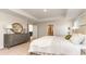 Comfortable main bedroom featuring neutral tones, cozy bedding, and elegant decor at 750 Plumage Ct., Myrtle Beach, SC 29588