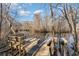 Picturesque dock and bench on calm waters, ideal for peaceful waterfront enjoyment at 80 Stonington Dr., Murrells Inlet, SC 29576