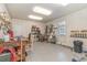 Functional workshop area with a workbench, tools, and shelving at 80 Stonington Dr., Murrells Inlet, SC 29576