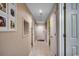 Hallway features neutral tones, tiled floors, and multiple doors for easy access to rooms at 806 Conway St. # 309, North Myrtle Beach, SC 29582