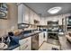 Bright kitchen with white cabinetry, stainless steel appliances, and dark countertops at 806 Conway St. # 309, North Myrtle Beach, SC 29582