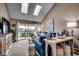 Comfortable living room filled with natural light, view to outdoor deck, and stylish decor at 806 Conway St. # 309, North Myrtle Beach, SC 29582
