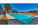 Large outdoor pool area featuring lounge chairs and tables for relaxation and enjoyment at 806 Conway St. # 309, North Myrtle Beach, SC 29582
