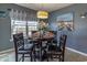 Charming dining area with seating for four and decorative accents at 8091 Bark Ct., Murrells Inlet, SC 29576