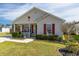Well-kept home with a cozy porch and manicured lawn at 8091 Bark Ct., Murrells Inlet, SC 29576