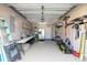Spacious garage with epoxy flooring, storage shelves, and room for tools and equipment at 8091 Bark Ct., Murrells Inlet, SC 29576