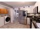 Updated kitchen with stainless steel appliances, pantry and access to the laundry area at 8091 Bark Ct., Murrells Inlet, SC 29576