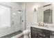 Modern bathroom with glass enclosed shower, marble accents, and vanity sink at 8285 Leone Circle, Myrtle Beach, SC 29579