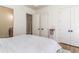 This neutral bedroom has multiple closets and hardwood floors at 8285 Leone Circle, Myrtle Beach, SC 29579