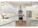 Spacious kitchen with granite countertops, stainless steel appliances, and custom cabinets at 8285 Leone Circle, Myrtle Beach, SC 29579