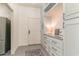 This mud room features built-in cabinets, granite counters, and neutral paint at 8285 Leone Circle, Myrtle Beach, SC 29579