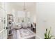 Bright, windowed office featuring tile floors, a desk, shelving, and comfortable chairs at 8285 Leone Circle, Myrtle Beach, SC 29579